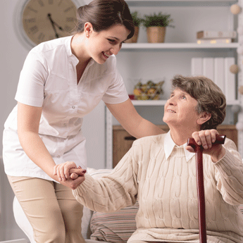 Caregiver Offering Support to a Senior Woman